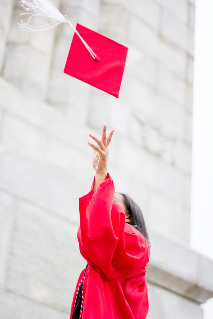 NC State Grad Photoshoot cap toss pose