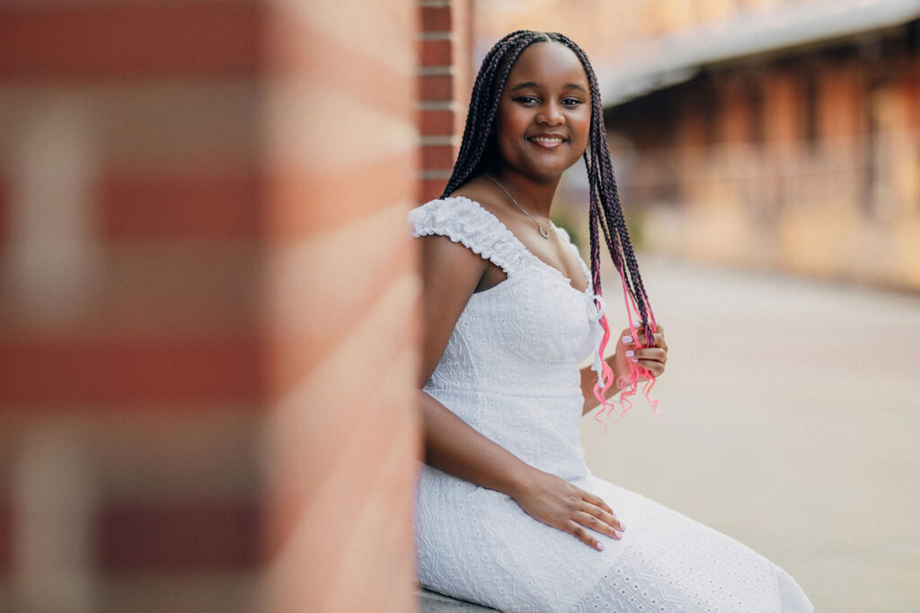 Class of 2025 senior portrait at American Tobacco Campus in Durham NC