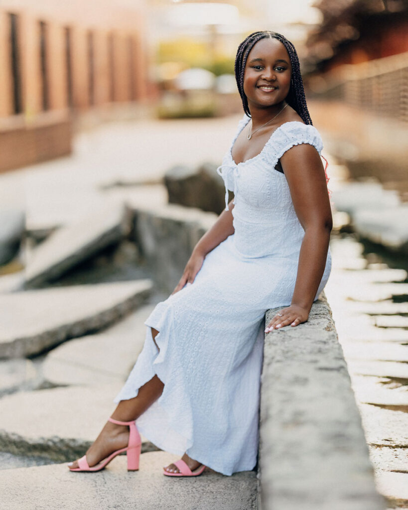 Boho-style senior portrait in downtown Durham's American Tobacco Campus