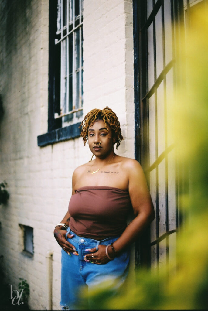 Urban film photography featuring neutral tones and soft grain texture