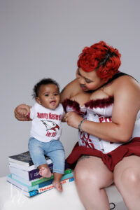 Mother and twins during emotional master’s grad session