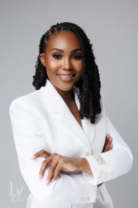Smiling professional portrait of Old Dominion University doctoral graduate